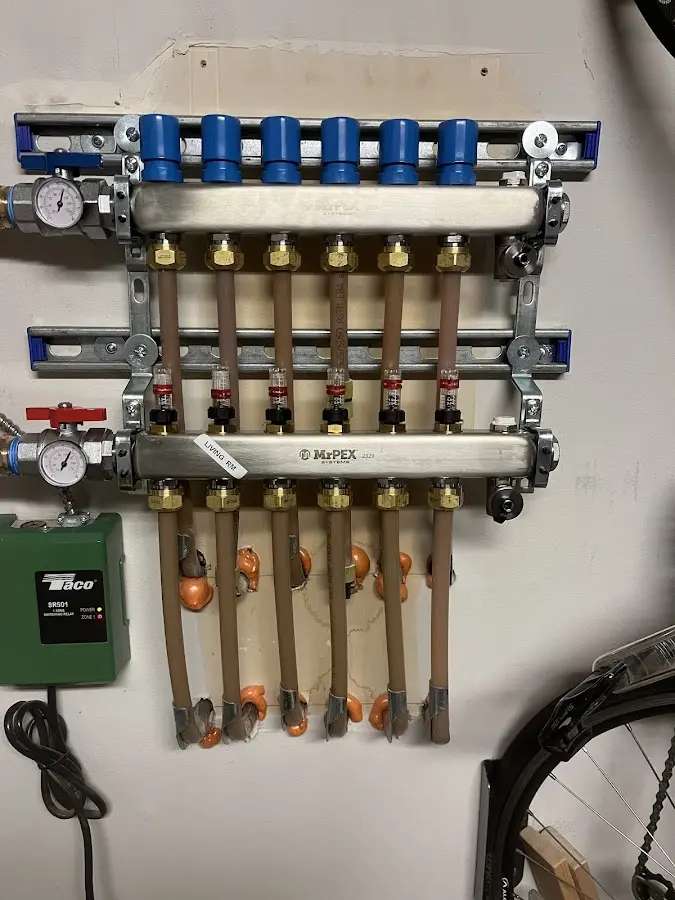 Plumber performing Gas Line Installation at a residential property in Wheaton